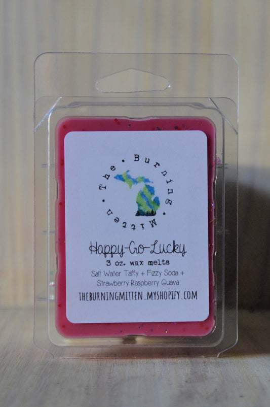 Happy-Go-Lucky Clamshell (salt water taffy + strawberry raspberry guava + fizzy soda)