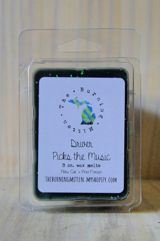 Driver Picks the Music Clamshell (new car + pine forest)